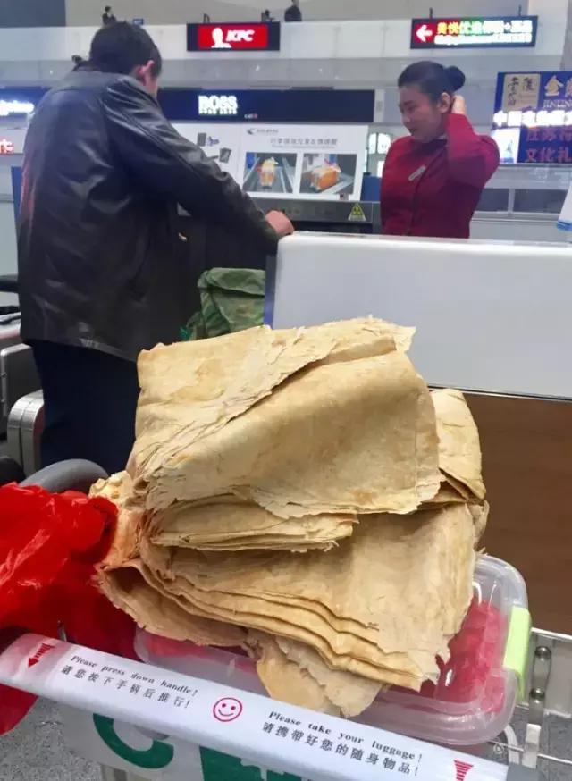 我妈让我带60斤大米去上班？