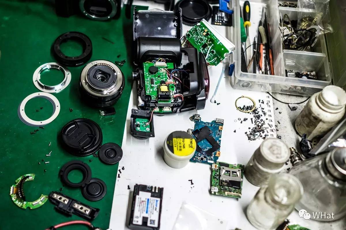 铜人像里藏着修相机的头牌师傅，33年的坚守积累千金不换的口碑