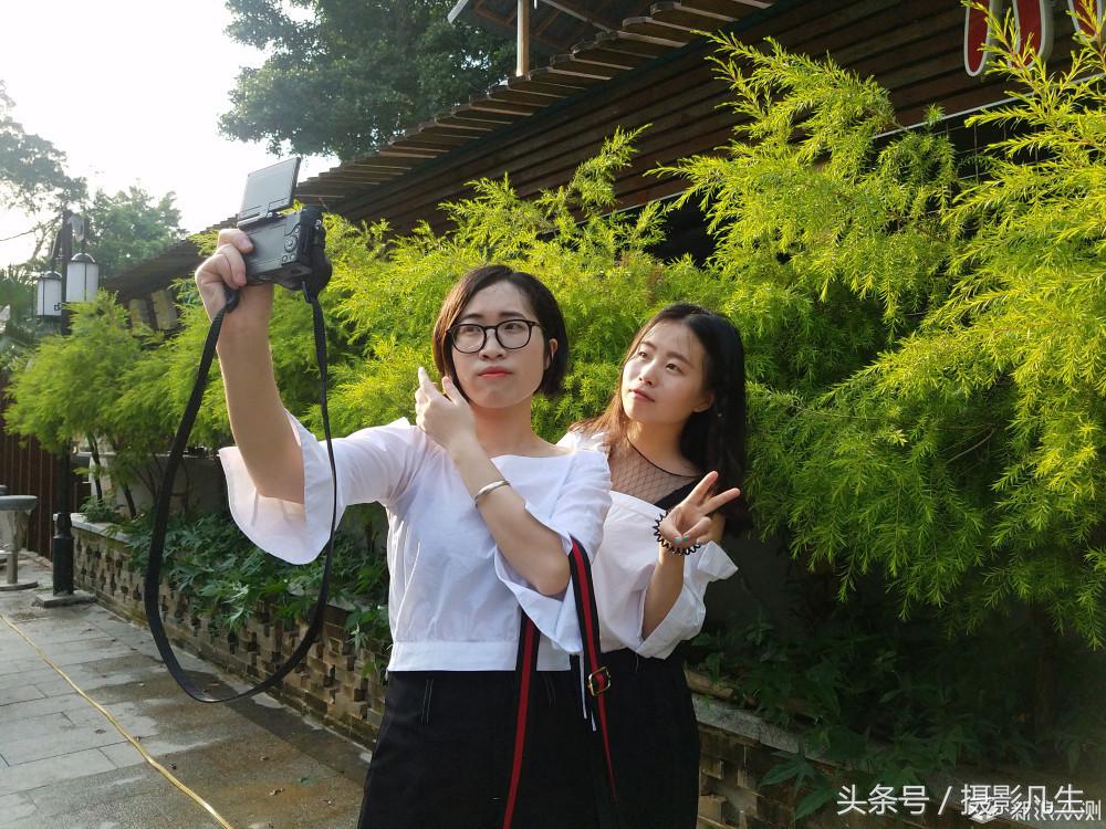 松下gf9可以自拍吗,带女朋友旅游拍照相机推荐