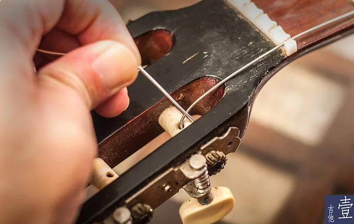 北航吉他,如何换吉他新弦