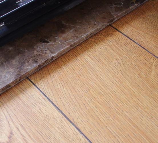 瓷砖铺完正常比没铺前高多少公分,瓷砖铺完了比客厅矮了五公分