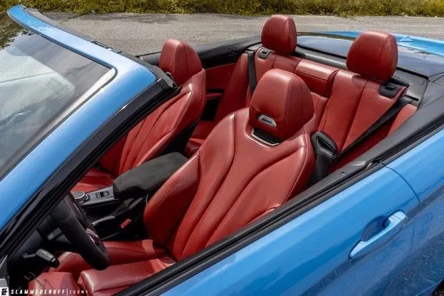 改装的宝马m4直接趴在地上了,普通的宝马m4可以开敞篷