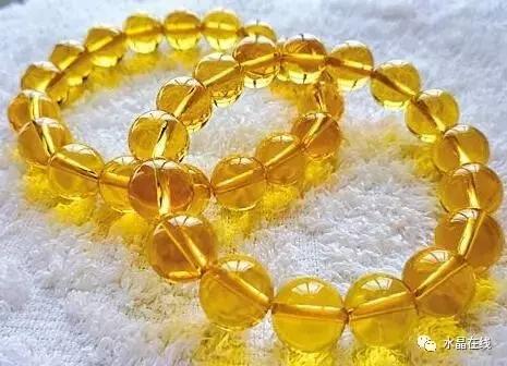 黄水晶珠子的鉴别真假图片,怎样鉴别黄水晶吊坠的真假