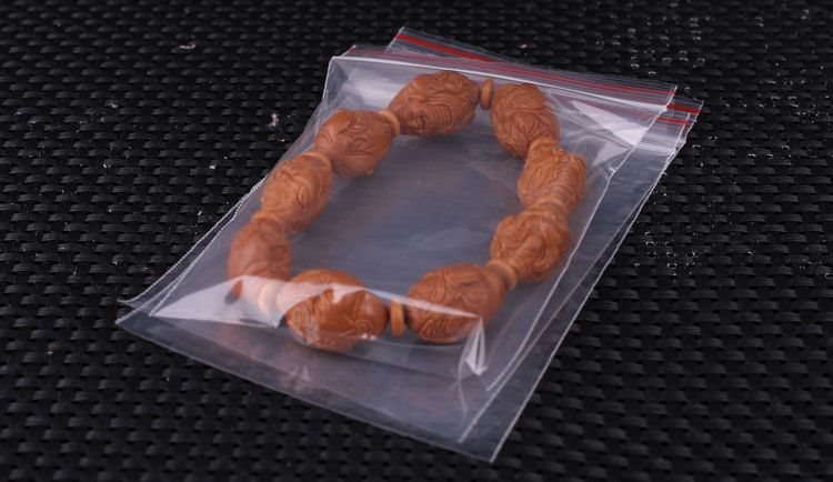 橄榄核雕开裂怎么修复视频,橄榄核雕刻盘玩会裂开