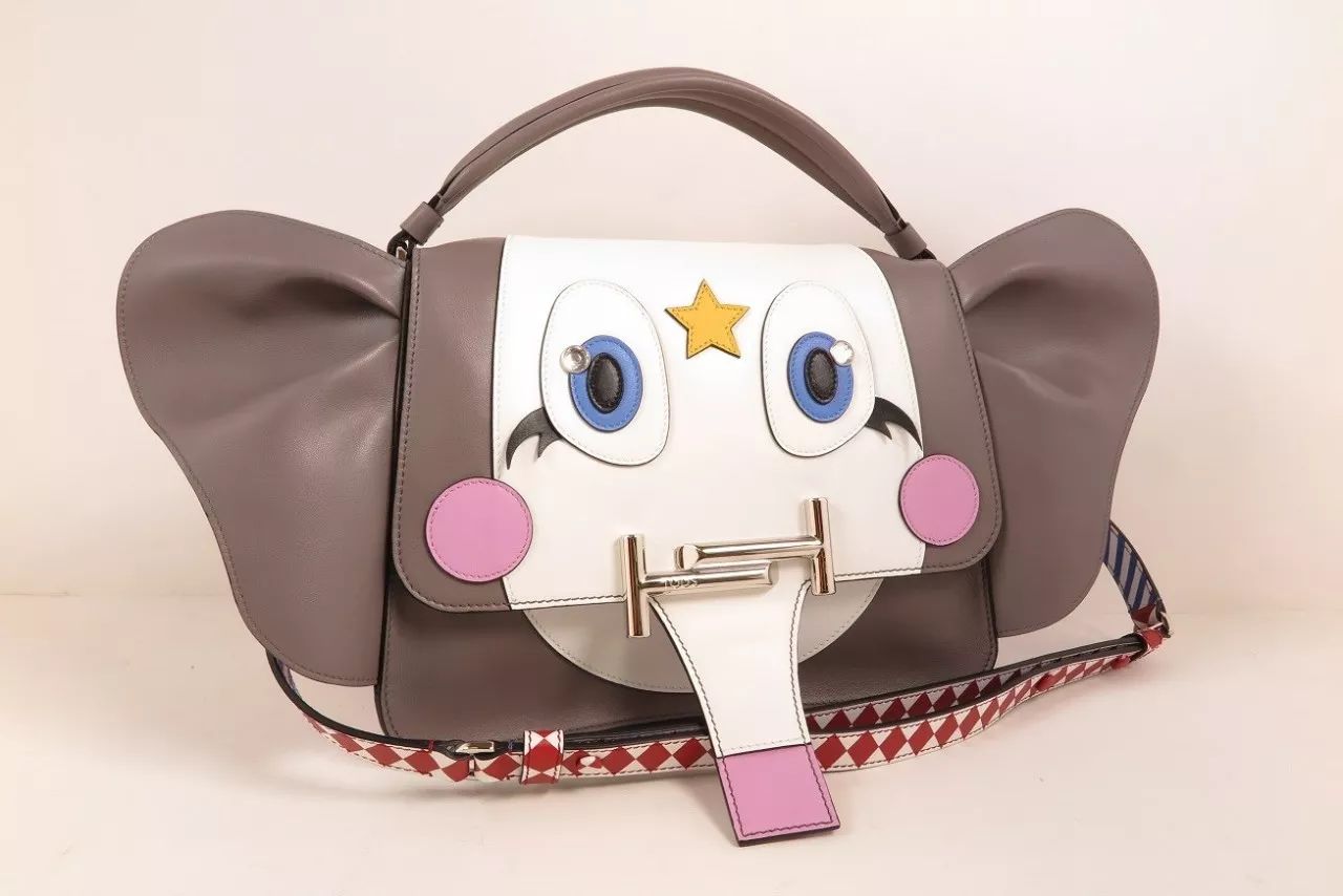 这只包包冲我做了一个鬼脸，我忍不住……