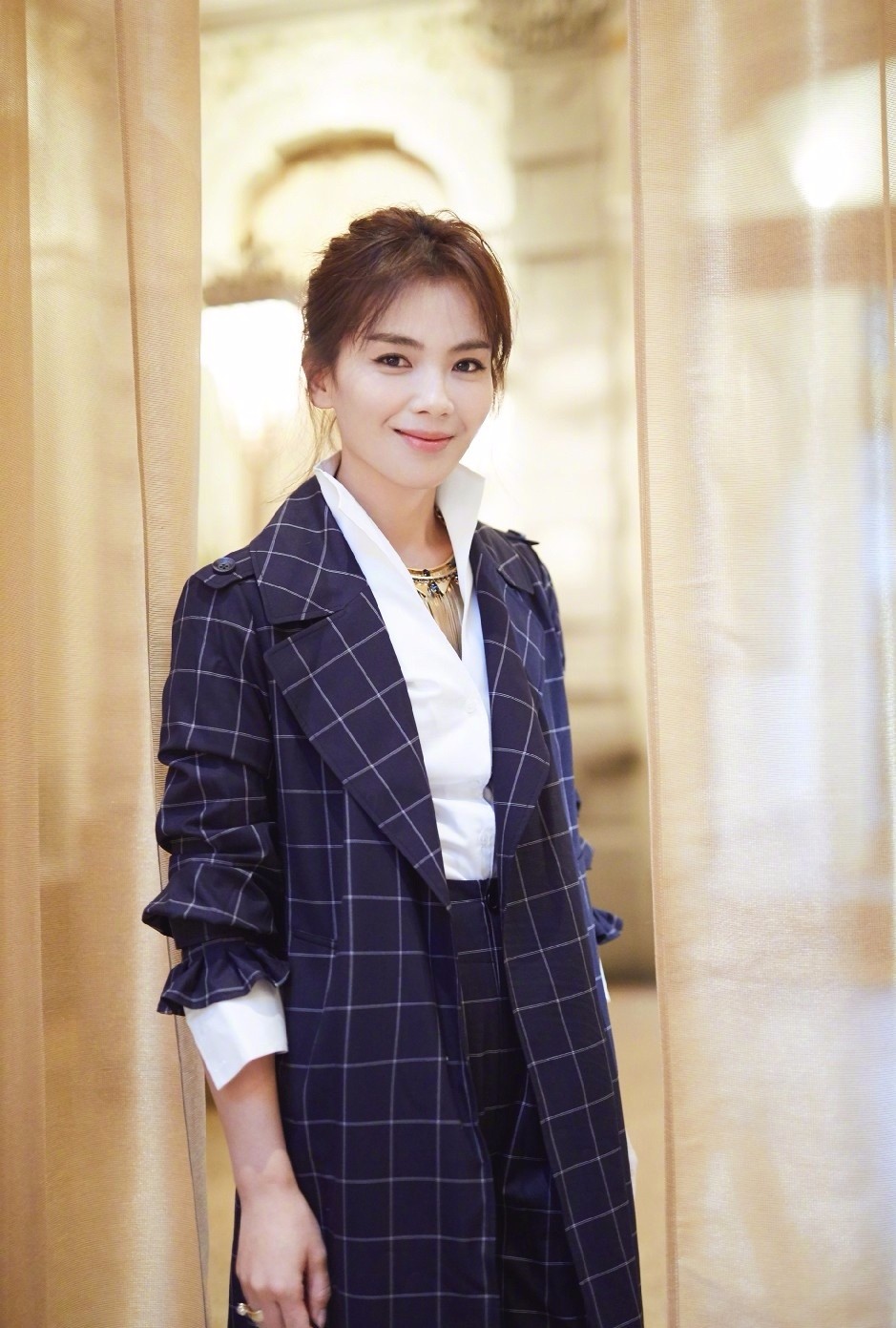 刘涛风衣秀,刘涛穿大衣现身春晚