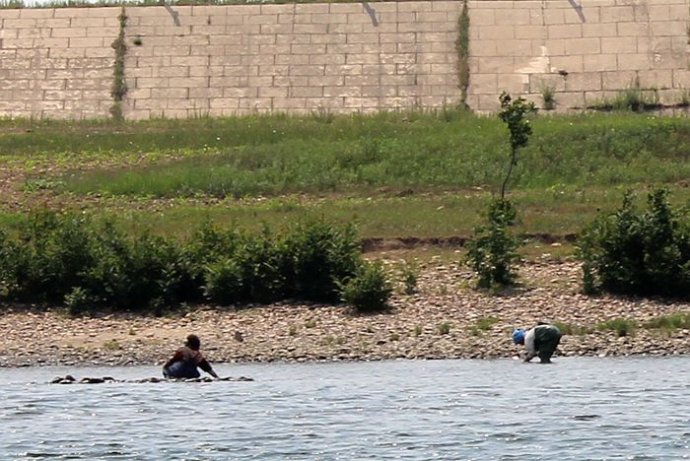 中朝边境美丽的风景,中朝边境桃花盛开的地方