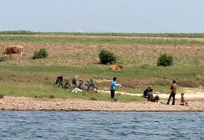 中朝边境美丽的风景,中朝边境桃花盛开的地方