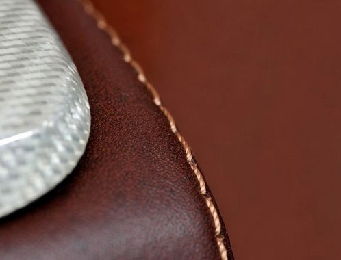 仿皮座椅织物座椅怎么样,仿皮座椅和织布座椅怎么辨别