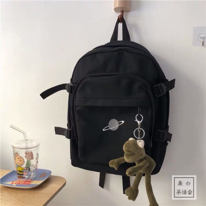 黑色抽绳双肩包出街百搭,双肩包出街推荐大学生小巧