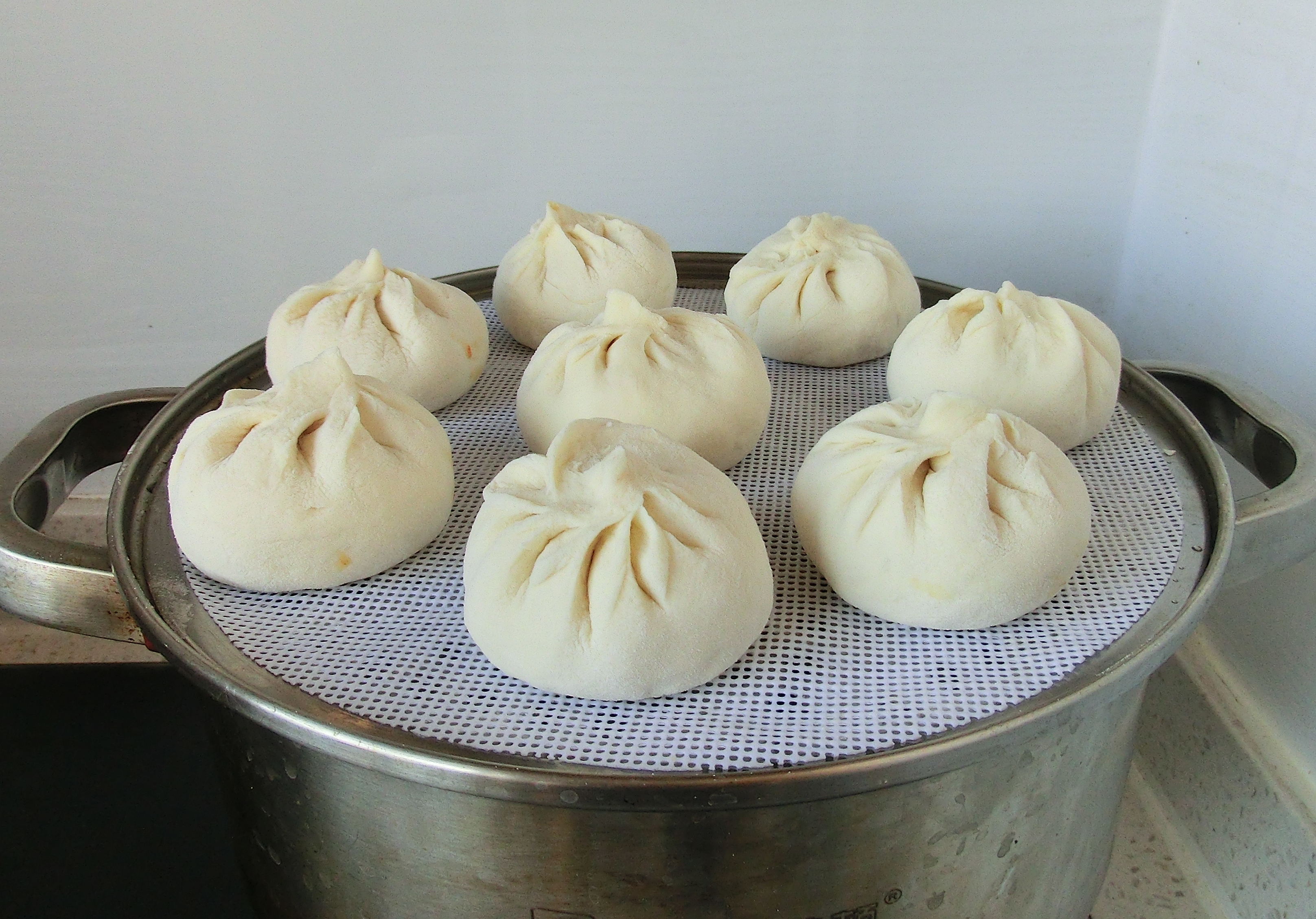 蒸包子的做法不要酵母粉,蒸包子时怎么让包子松软不塌陷