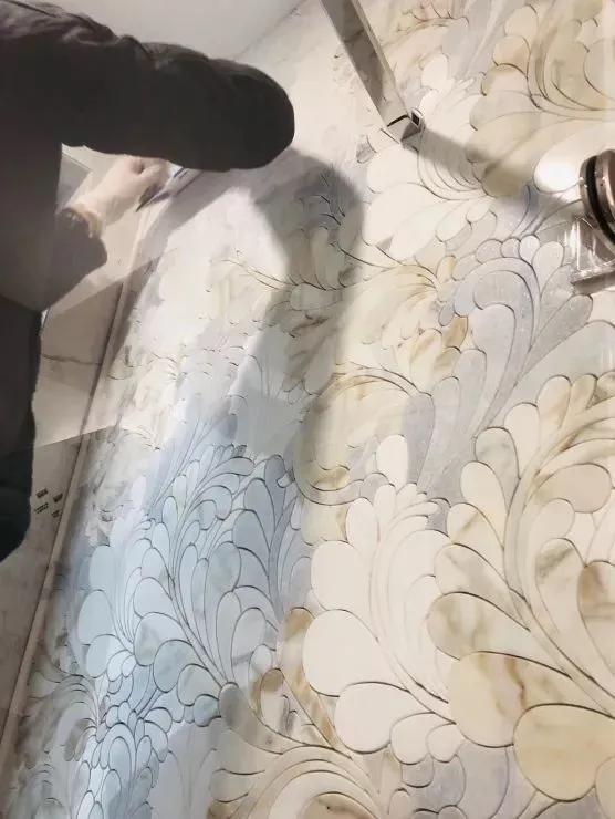 椭圆形石材马赛克拼花图案,河北地面马赛克水刀拼花施工安装