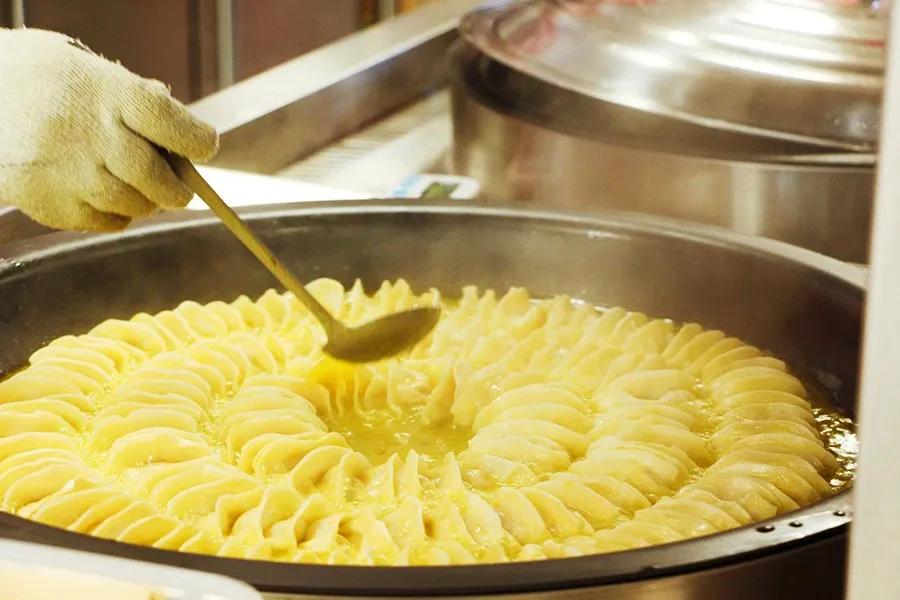 杭州正宗锅贴哪家好吃,上海好吃的锅贴店排名