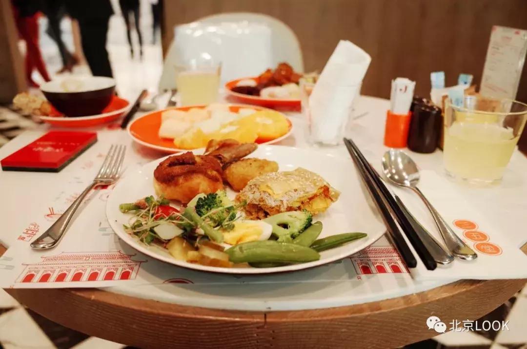 央视大楼对面网红餐厅,央视大楼隔壁酒店