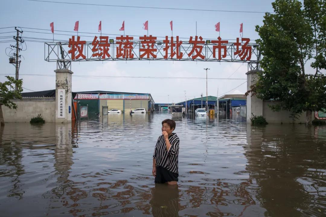 人在新乡，我们的家还在水里