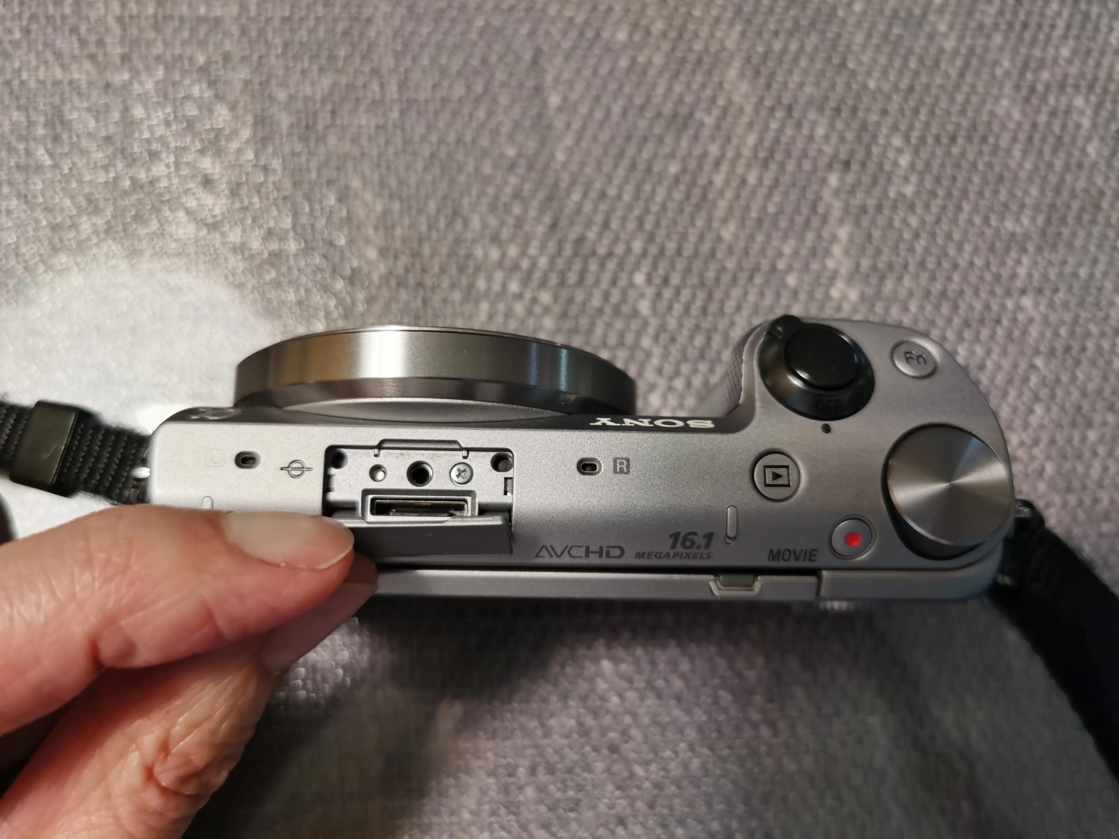 索尼相机更换快门组件,索尼微单相机电池盖拆卸教程