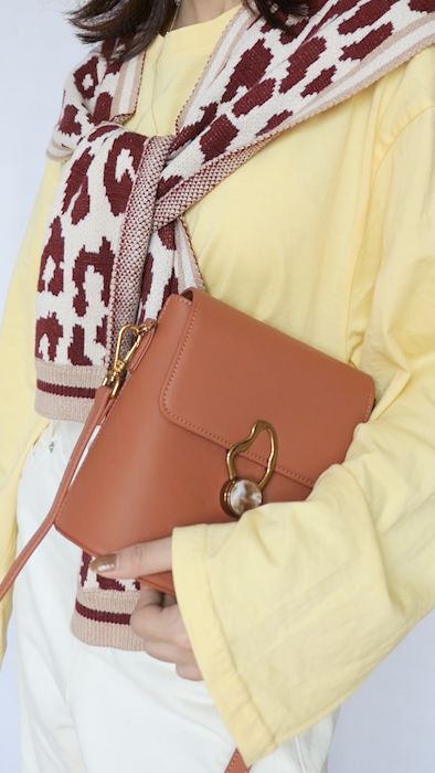 最节省空间又简便的叠风衣方法,薄款中长风衣怎么叠