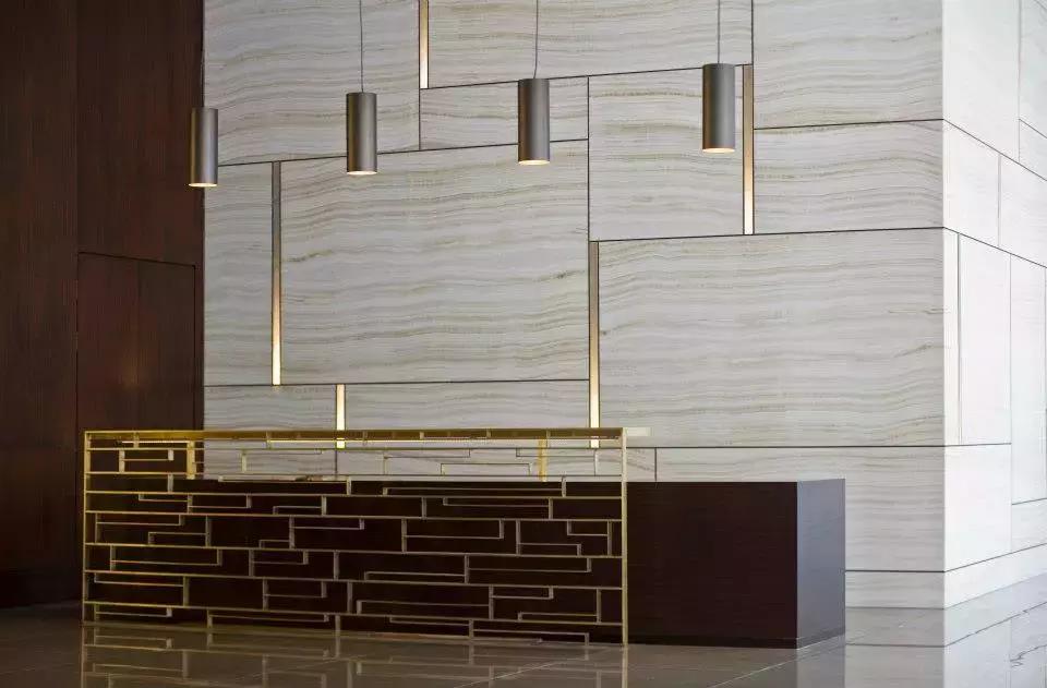 墙面石材干挂镜面处理,干挂石材墙面沉降缝的施工方法