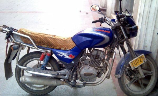 125摩托一升油能跑多远,125摩托车每100公里几升油