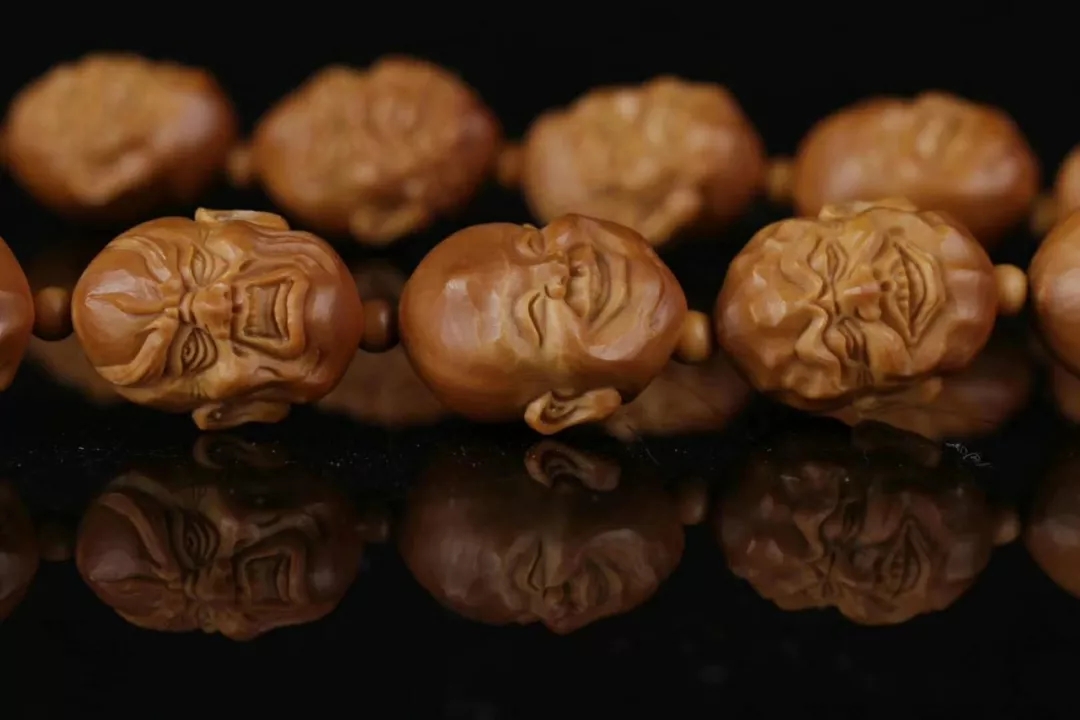十八罗汉橄榄核怎么按顺序来穿 (核雕十八罗汉怎么区分)