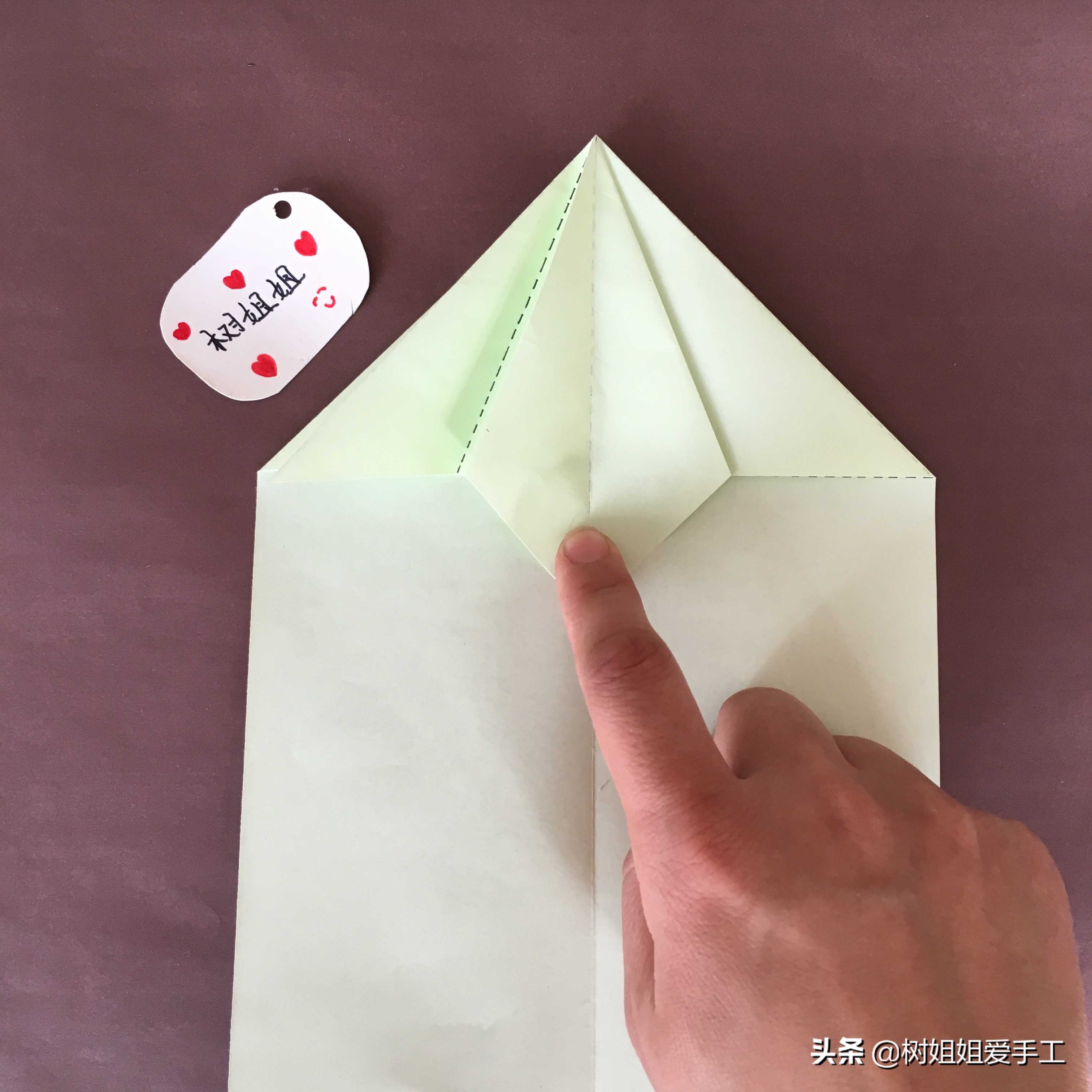 拖尾孔雀的三角插教程,折纸孔雀尾巴怎么折