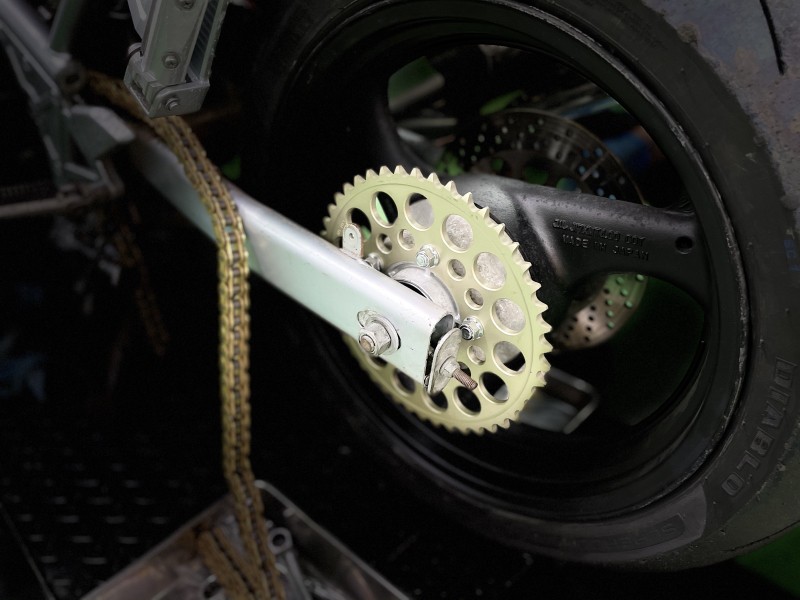 摩托车前链条改16齿,摩托车换牙盘链条教程