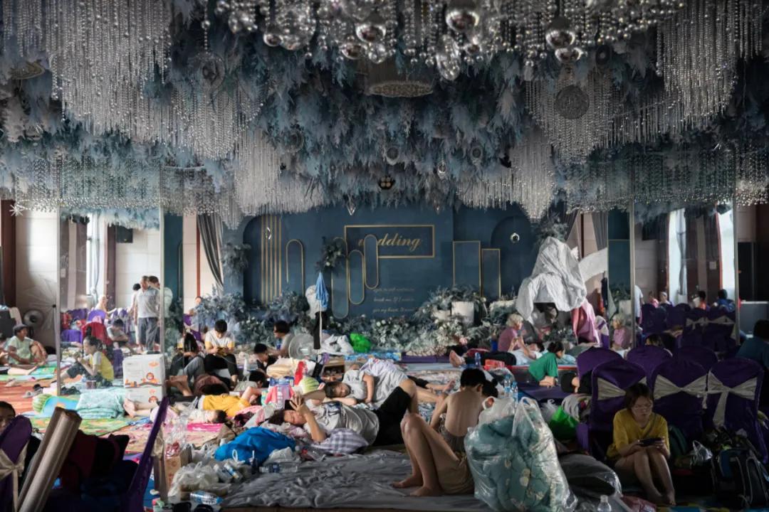 人在新乡，我们的家还在水里