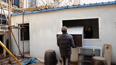 老旧小区提升改造临街墙面换新颜,老城改造再发力持续改善人居环境