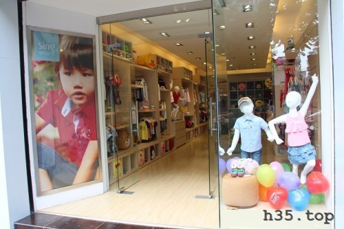 最新童装店双门头装修效果图,童装店怎么装修才有顾客