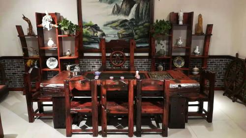 佛山木饰面板酒店装修效果图,木饰面板酒店民宿装修效果图