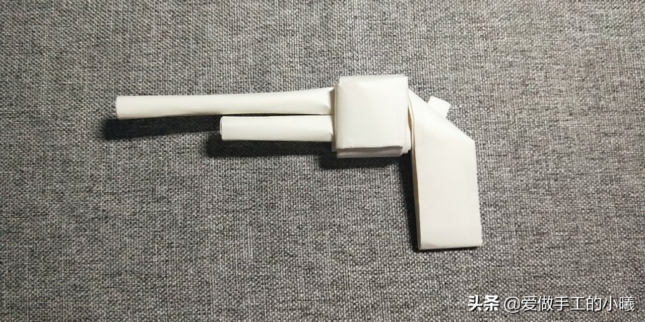 手枪手工折纸长30厘米宽10厘米,童年折纸手枪的子弹怎么做