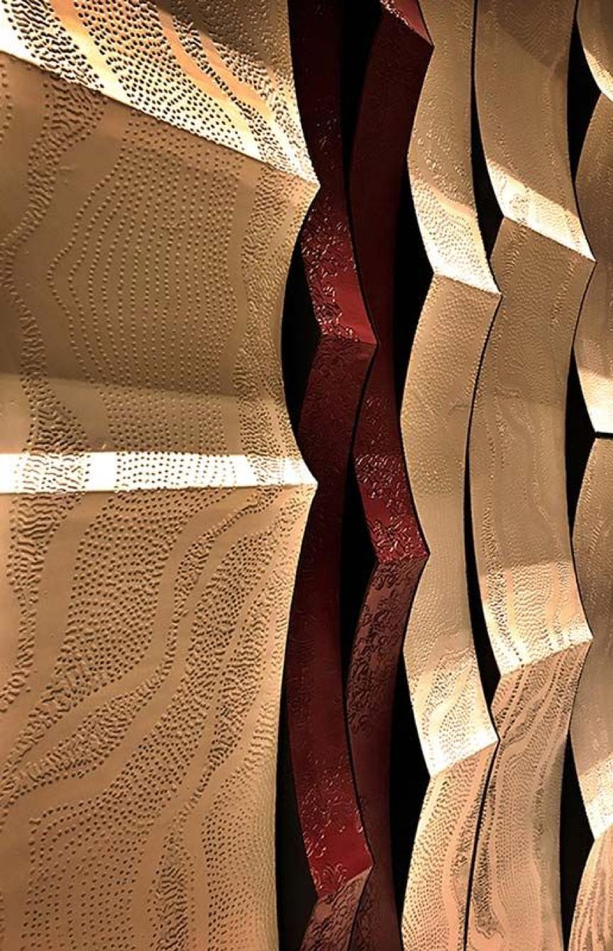 皮雕墙面做法,皮雕上墙设计方法