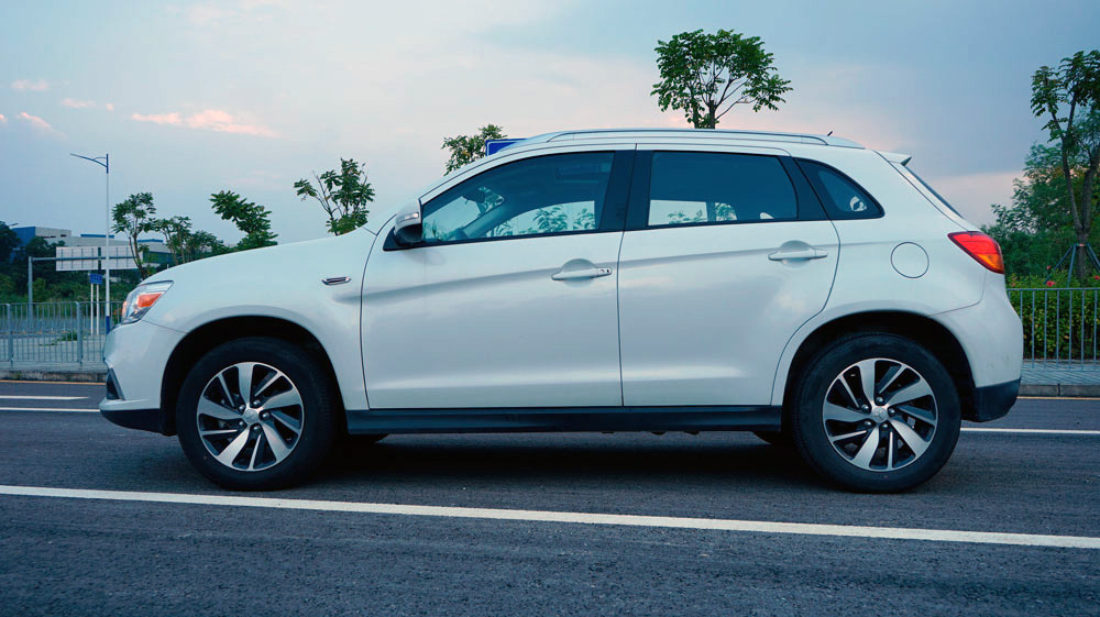 日系三菱suv劲炫轴距,广汽三菱suv劲炫和大众探影哪个好