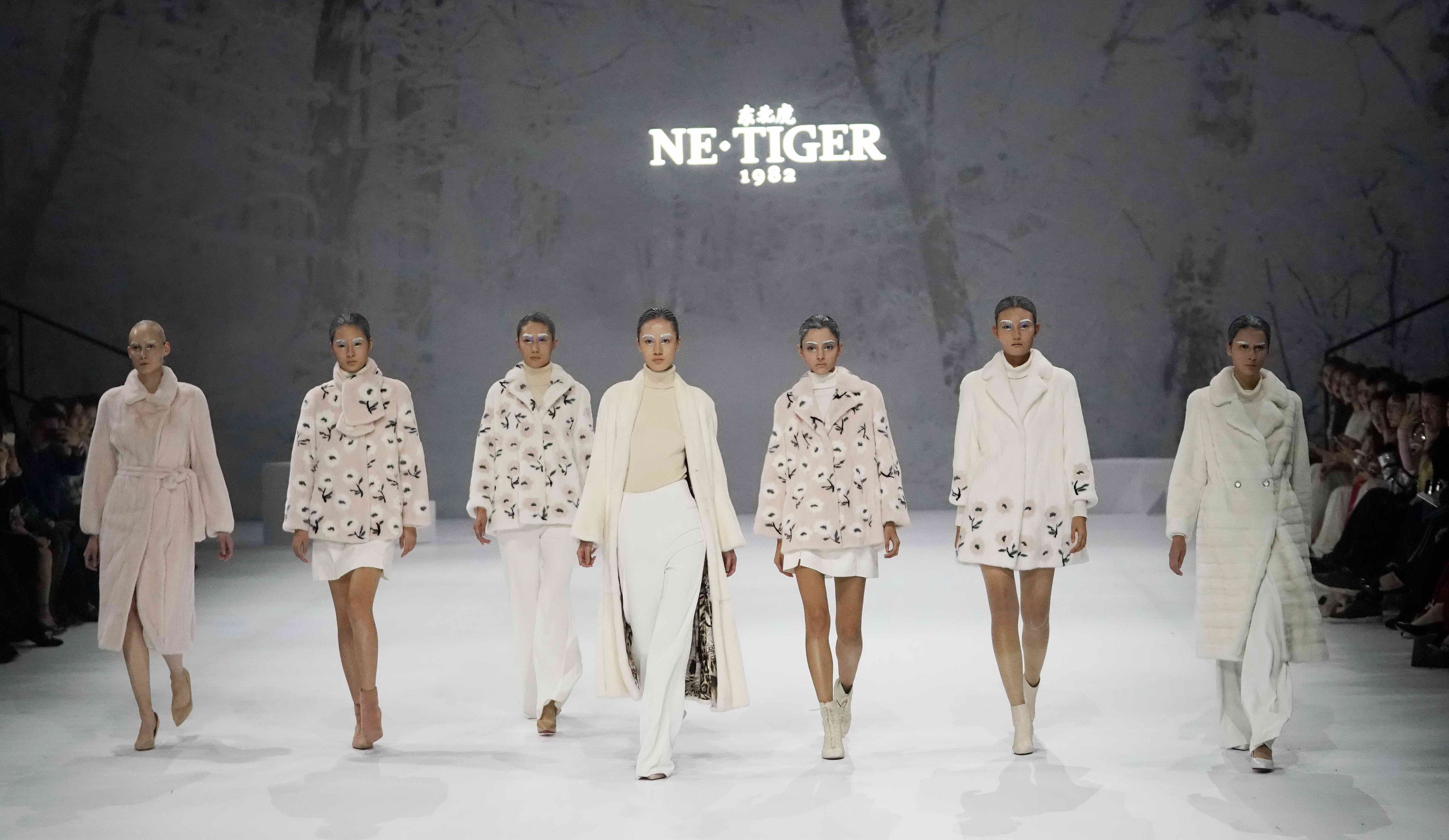 netiger高定晚礼服,netiger东北虎品牌logo