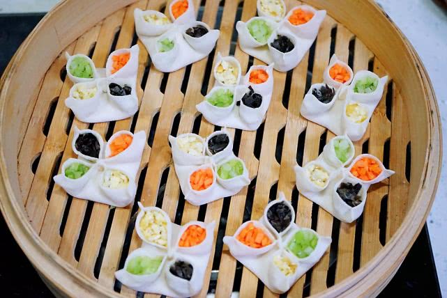孩子不爱吃菜家长怎么做,好看又好吃的传统点心四喜蒸饺