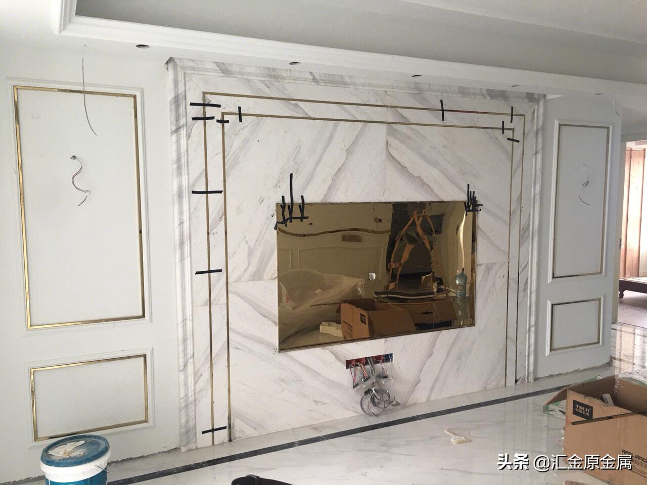 金属背景墙装修效果图,金属线条电视背景墙效果图