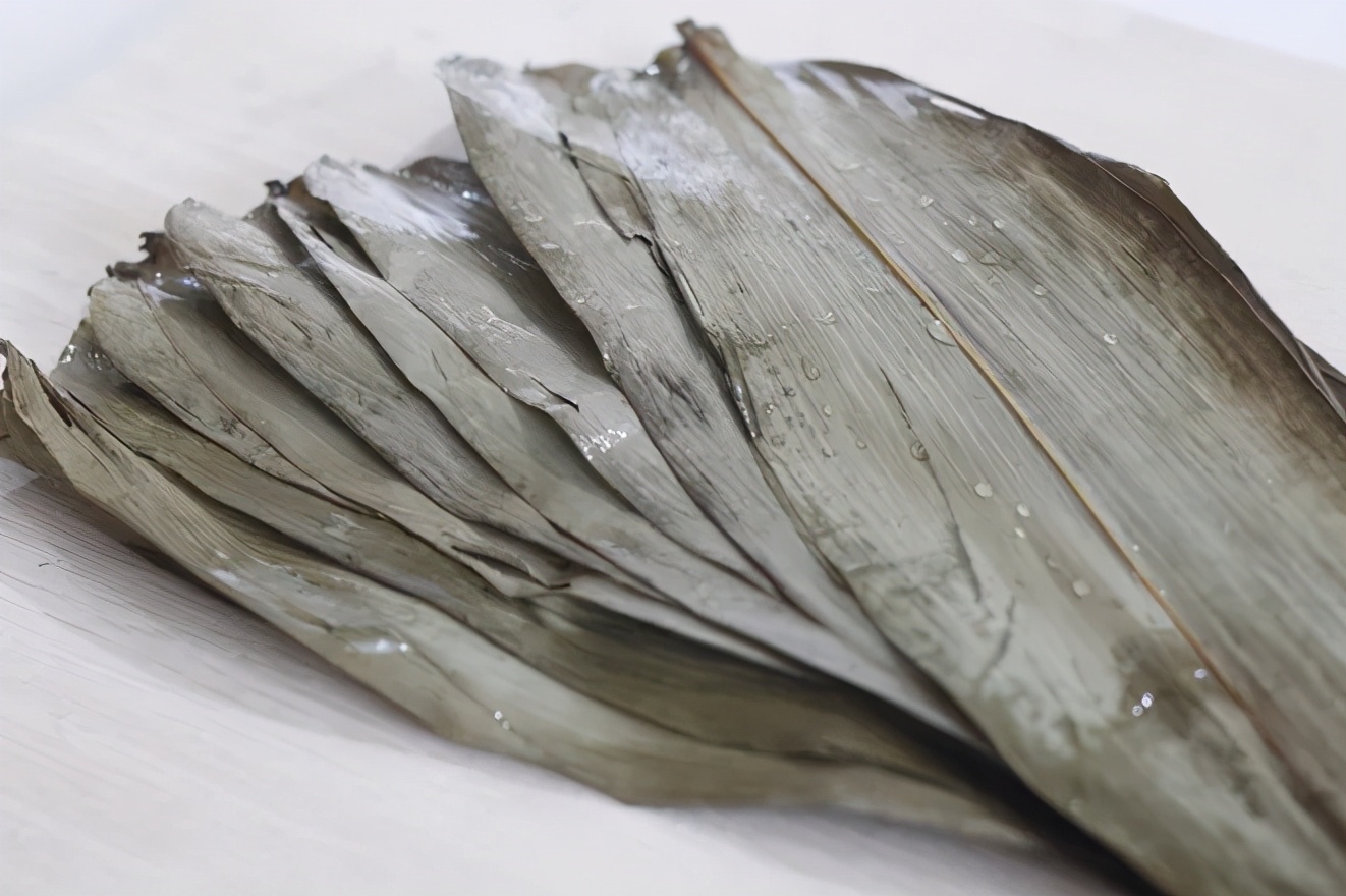 粽子怎么能包的特别紧不漏米,煮粽子时为何会出现粽子夹生现象