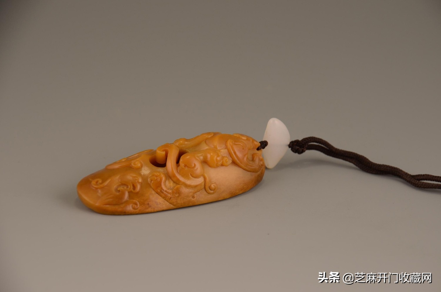 真正的和田玉黄皮籽料价格,新疆和田黄玉籽料是什么样子