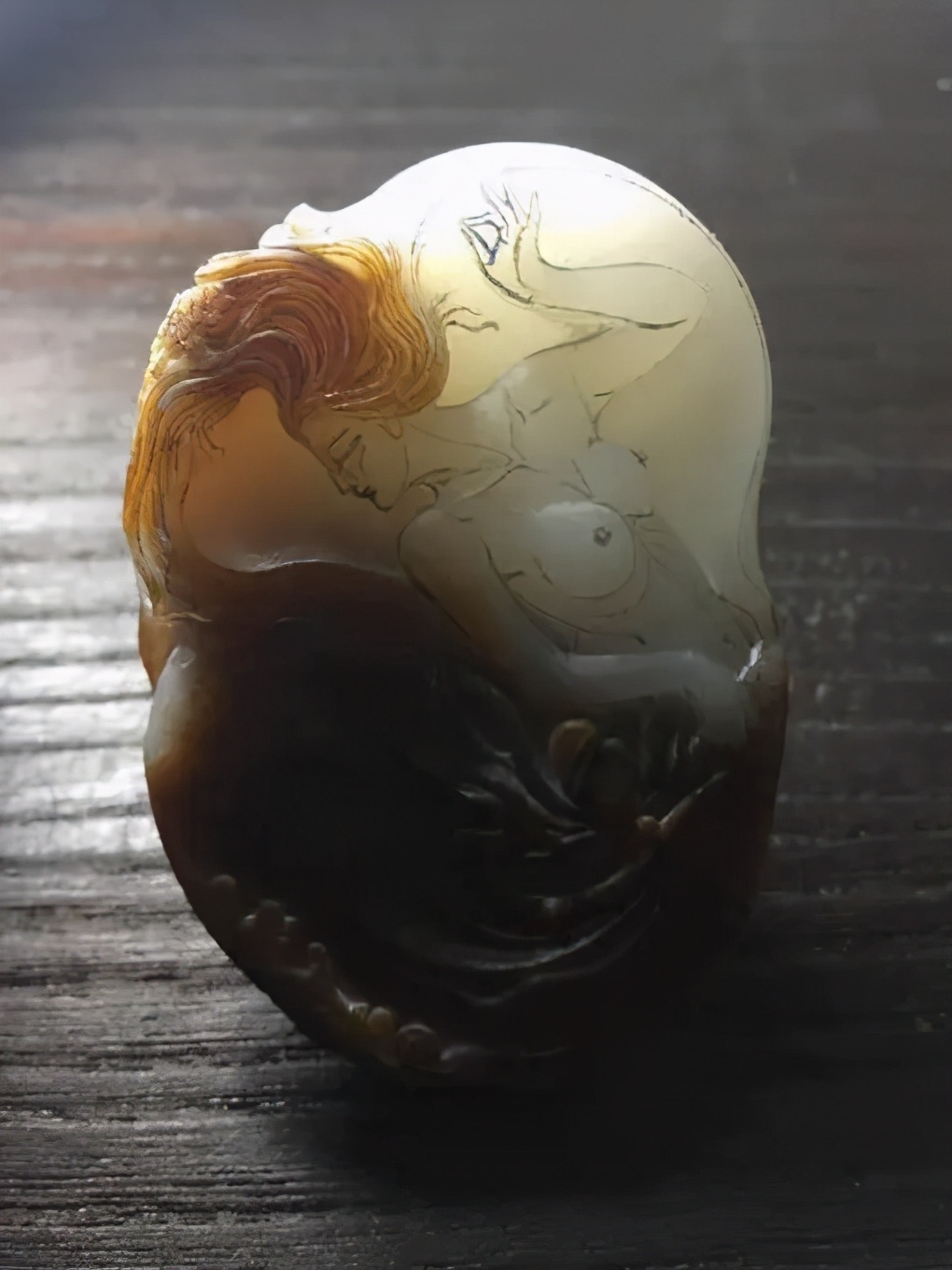 和田玉买来后发现多了一个黑点,和田玉内部有块状白斑还值钱吗