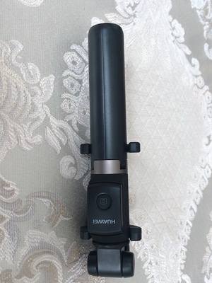 华为三脚架自拍杆af15怎么用,华为有线自拍杆的使用方法及操作