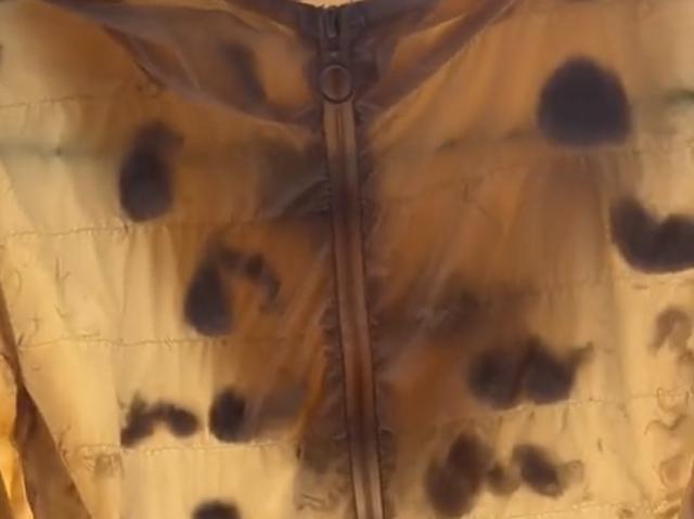 用洗衣机洗羽绒服的正确方法,女子用洗衣机洗完羽绒服