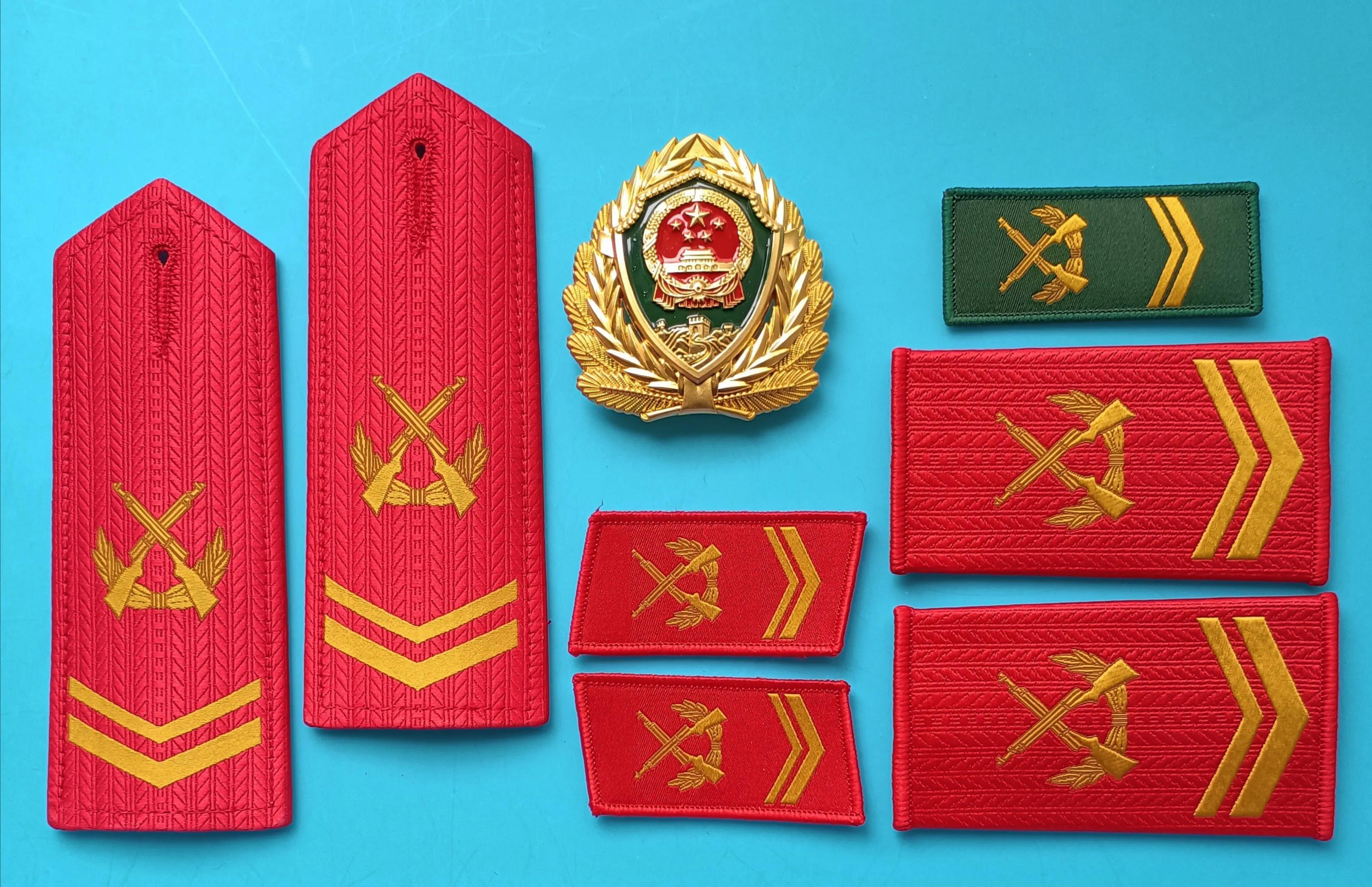 毛启国军装,毛启国警用帽徽