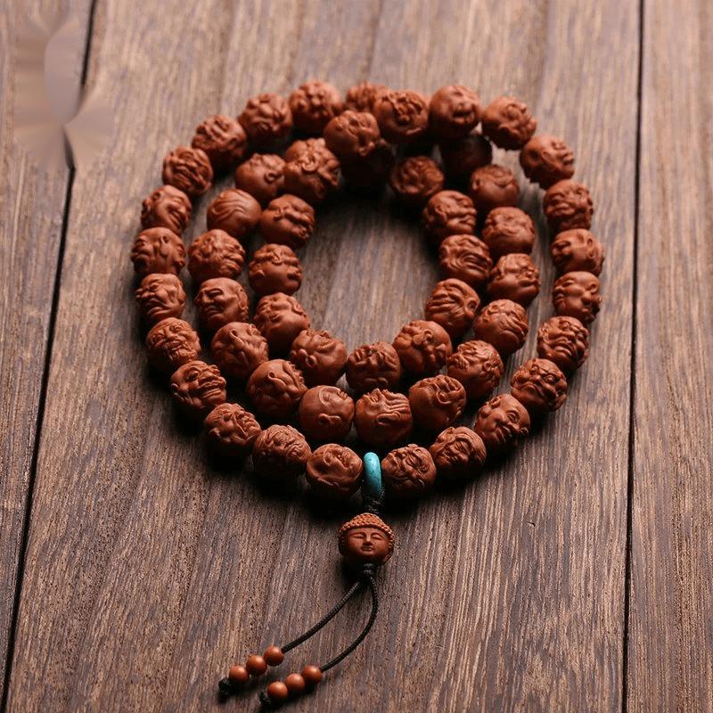 橄榄核雕方寸之间,舟山核雕方寸之间