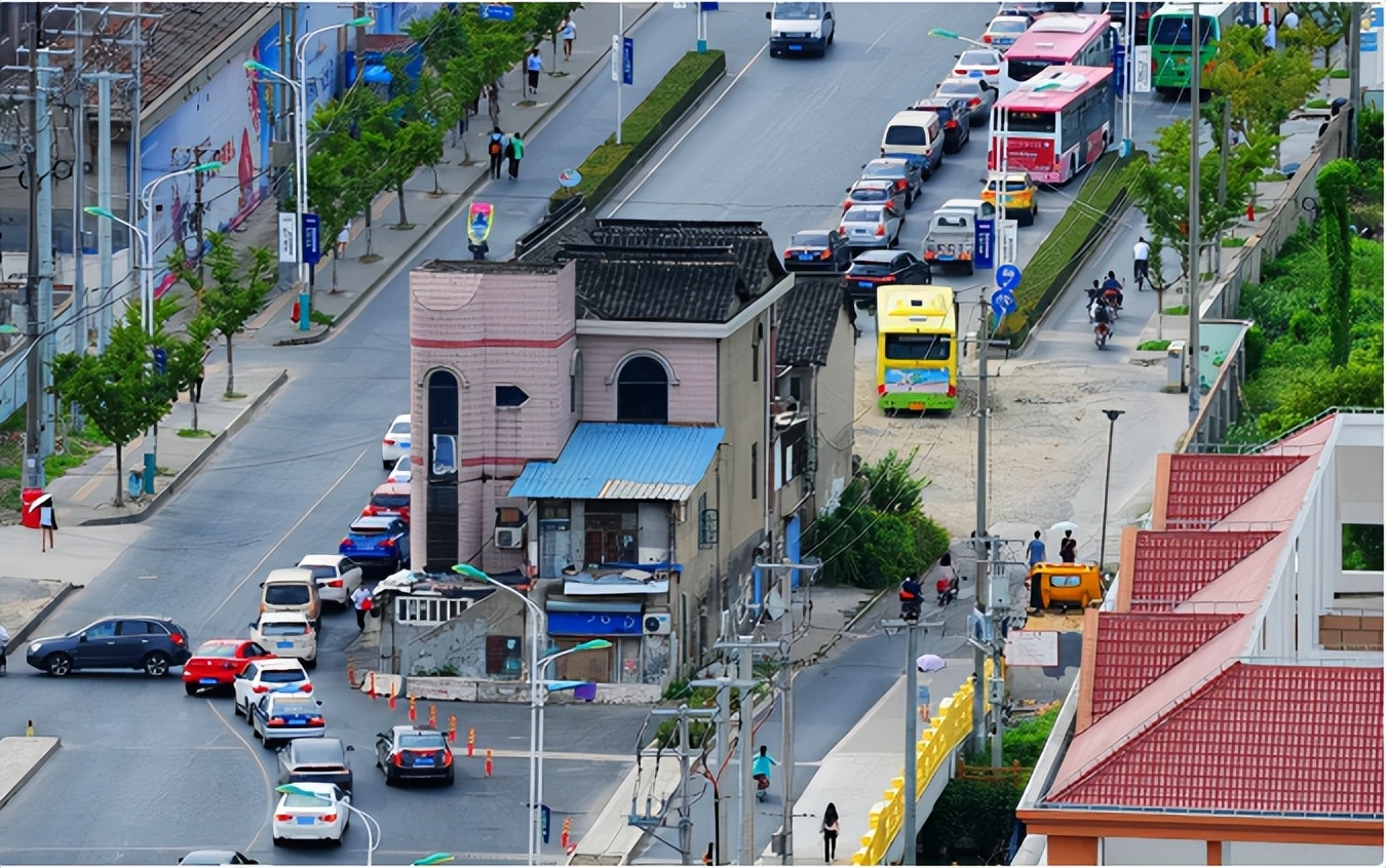 上海钉子户张新国硬撑14年,上海最牛的钉子户张国良