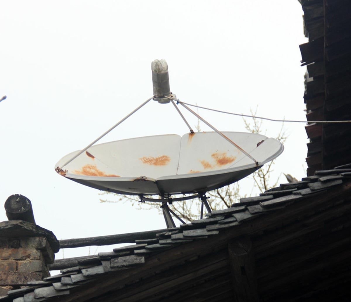 农村用锅盖的电视能在城里用吗,农村电视锅盖安装违法吗