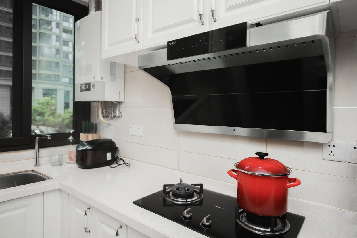 油烟机要买顶吸还是买侧吸,油烟机是买侧吸的还是买顶吸的