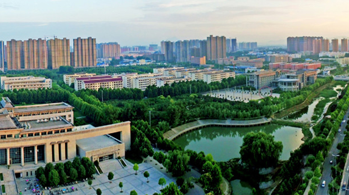 黄淮学院属于驻马店驿城区哪个镇,黄淮学院的前身是驻马店学院