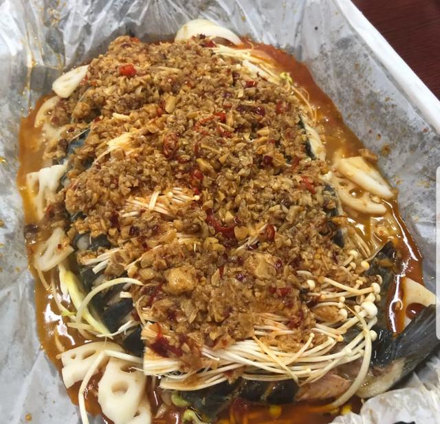 特色纸包鱼川渝菜馆,大东的纸包鱼店