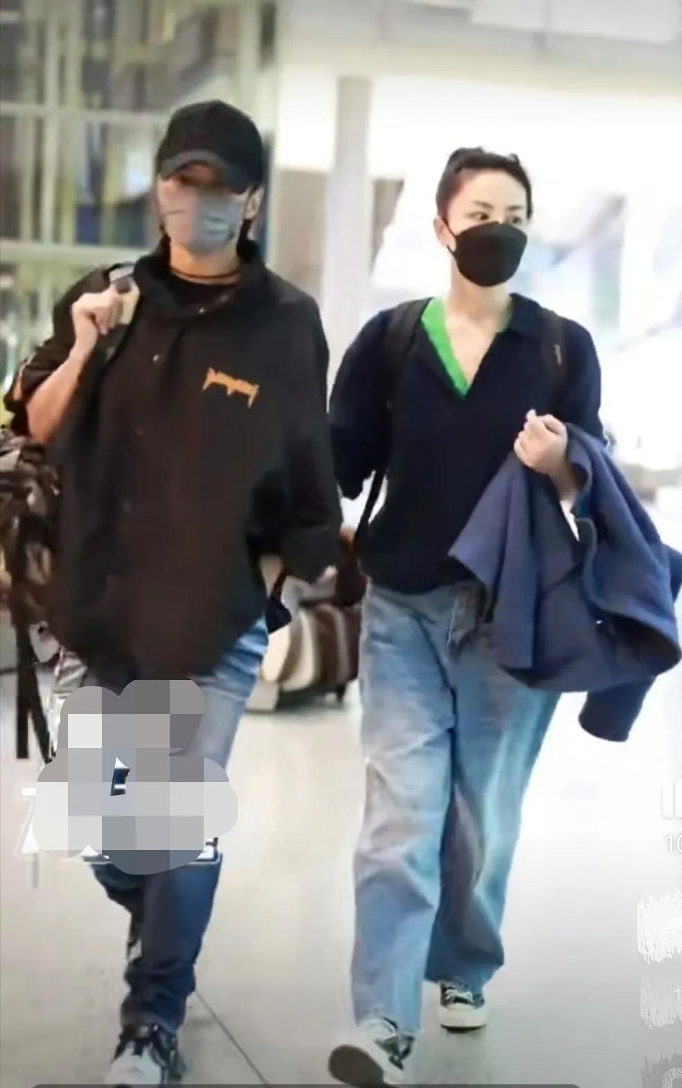 谢霆锋和王菲高调秀恩爱,王菲谢霆锋机场秀恩爱视频