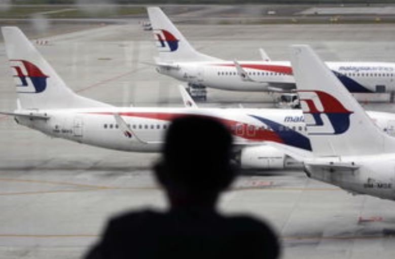 马航mh370失联后机长能不能落地,马航370失联的机长
